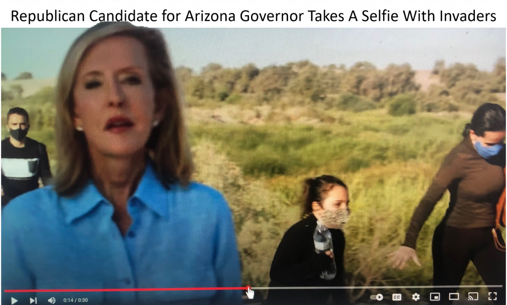 Karrin Taylor Robson in  front of alleged "invaders" from south of the border.