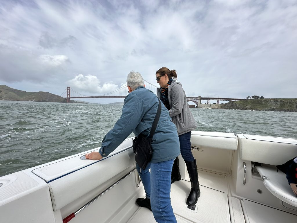 Kris and Meg Tully scatter Fritz Kinney's ashes in the Pacific, just west of the Golden Gate Bridge.
